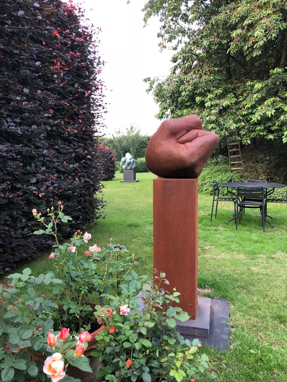 View of sculptor Etienne Desmet's exhibition in the Ooidonk gallery garden.