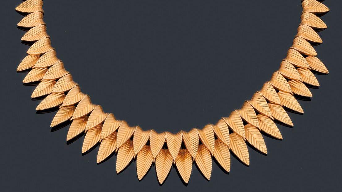   A Gold Necklace By Cartier