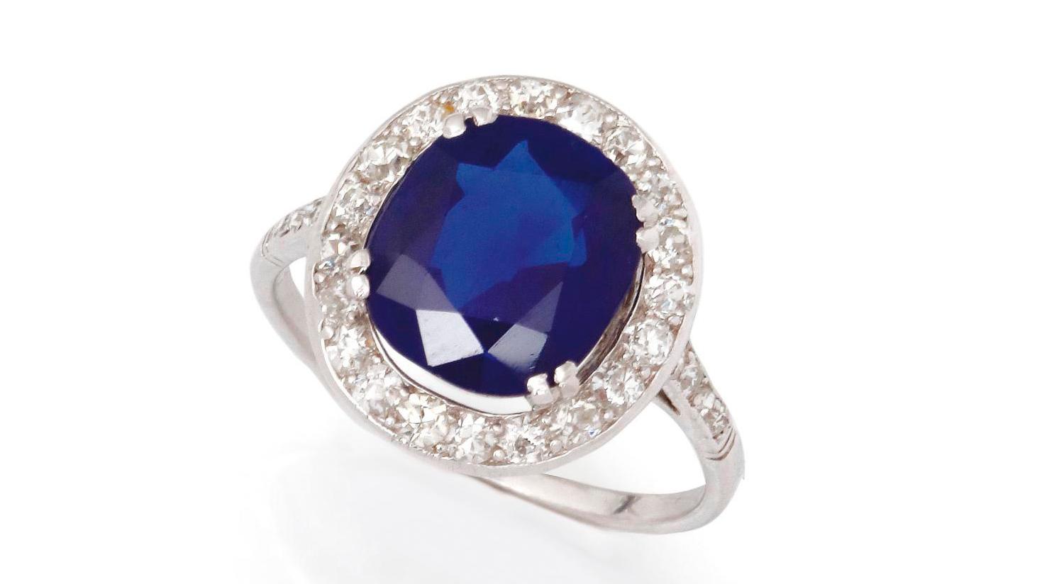 Platinum ring with an oval 3.60-carat Kashmir sapphire surrounded by old-cut 8-8... Kashmir Blue: The Color of Rarity
