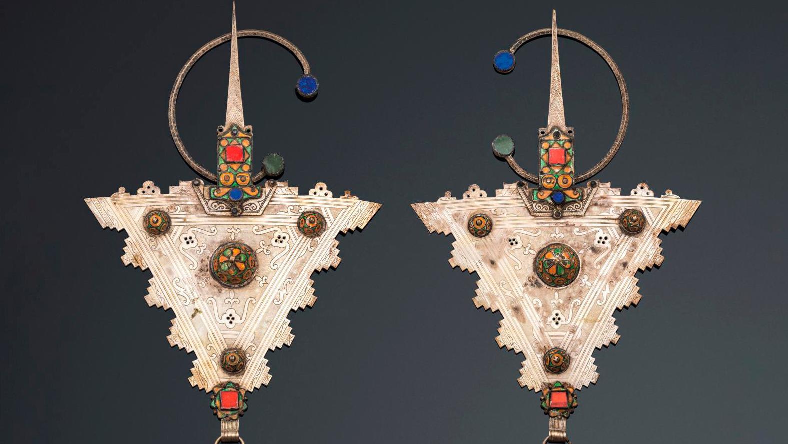 Morocco, Tiznit region, c. 1930. Pair of silver Tizerzaï fibulae in cut, engraved... Middle Eastern Adornments: A Collection of Moroccan Jewelry