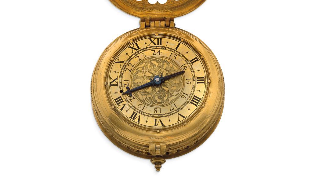 Augsbourg, milieu du XVIe siècle. Montre horloge primitive en métal doré à arabesques... Au temps des premières montres