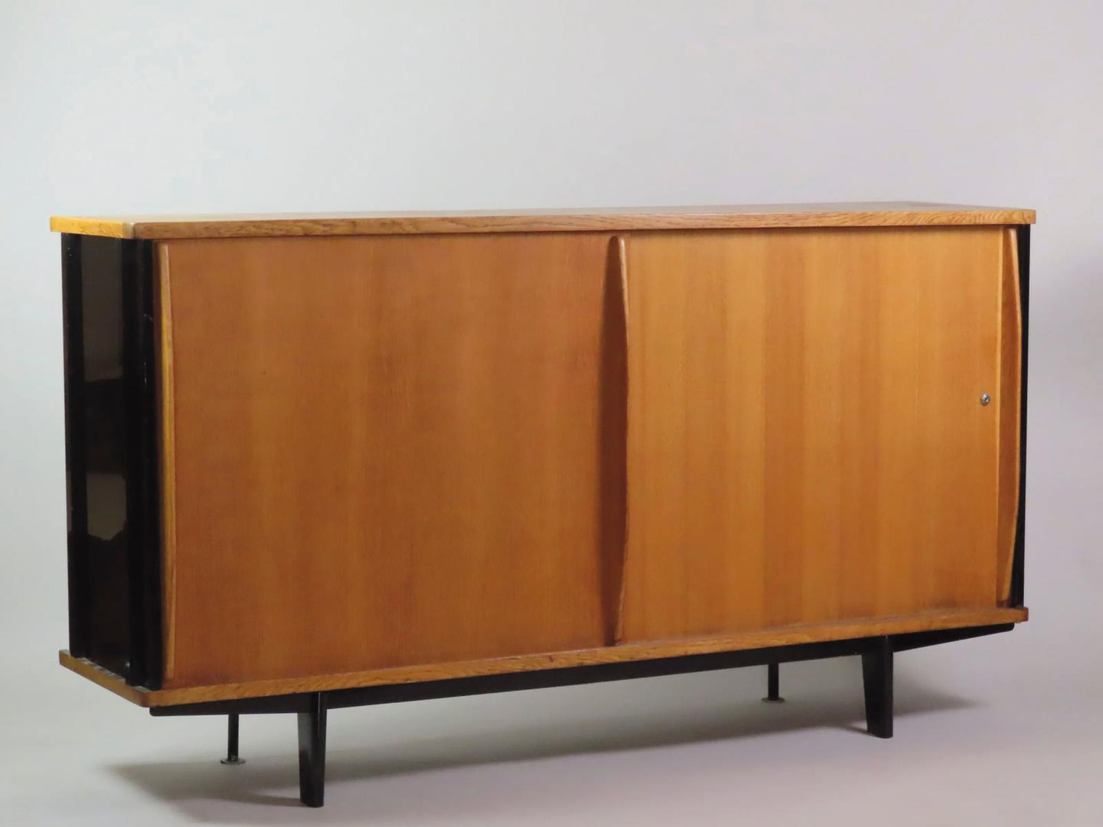 A Sideboard and Chairs by Jean Prouvé 