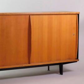 A Sideboard and Chairs by Jean Prouvé 
