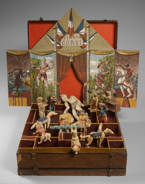 1 612 € Boîte de jeux du cirque Corvi présentant un dresseur d’animaux sur une piste, figurines en caoutchouc avec animation musicale, XIX