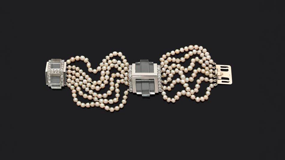 Boucheron, Art Deco bracelet, rows of fine pearls, rock crystal motifs embellished... Boucheron Bracelet: Art Deco Jewelry Rides High
