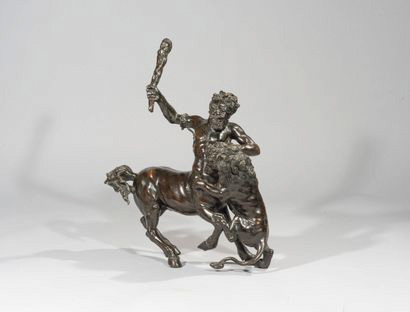 10 846 € XIXe siècle, d’après le modèle italien du XVIIe siècle, Le Centaure Chiron attaquant un lion, groupe en bronze à patine brune, 45