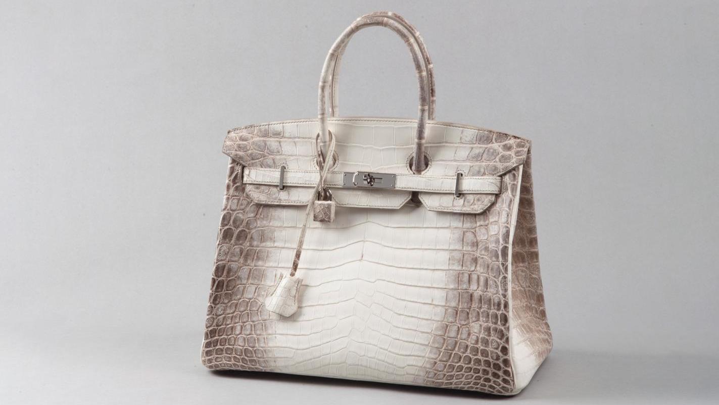 124 800 € 2016, sac de 35 cm en Crocodylus niloticus Himalaya, attaches et fermoir... Cote : le sac Birkin, par Hermès