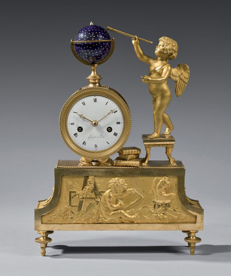 4 375 € Pendule à décor d’un Amour astronome observant une planète, époque Louis XVI, bronze doré, émaux, 37,5 x 27 x 7 cm. Nogent-sur-Marne, 27 novem