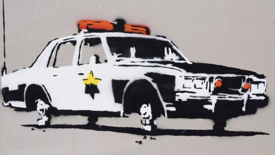 Banksy (né en 1975), Police Car, 2003, peinture aérosol et technique mixte sur carton,... Sirènes hurlantes pour Banksy et le street art !