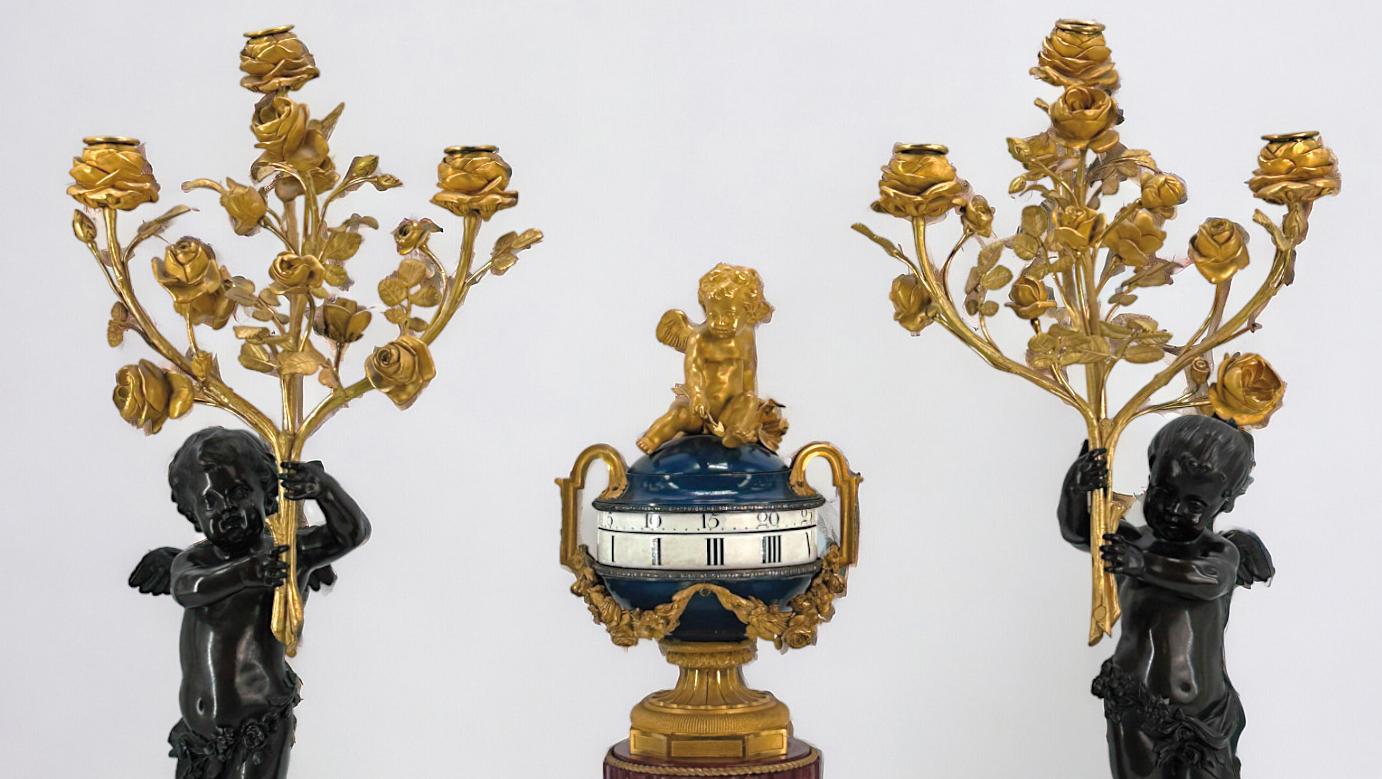 Henry Dasson (1825-1896), garniture de cheminée en bronze patiné, bronze doré et... Henry Dasson au coin du feu