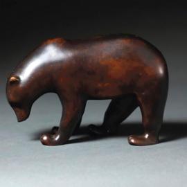 Un petit ours brun griffé Pompon