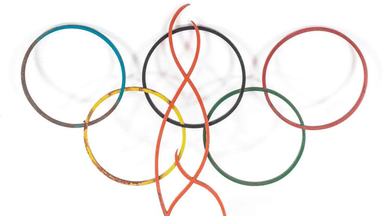 Woerth, emblème de la torche des Jeux d’Albertville, surmonté des anneaux olympiques,...  Jeux Olympiques aux enchères : les seigneurs des anneaux