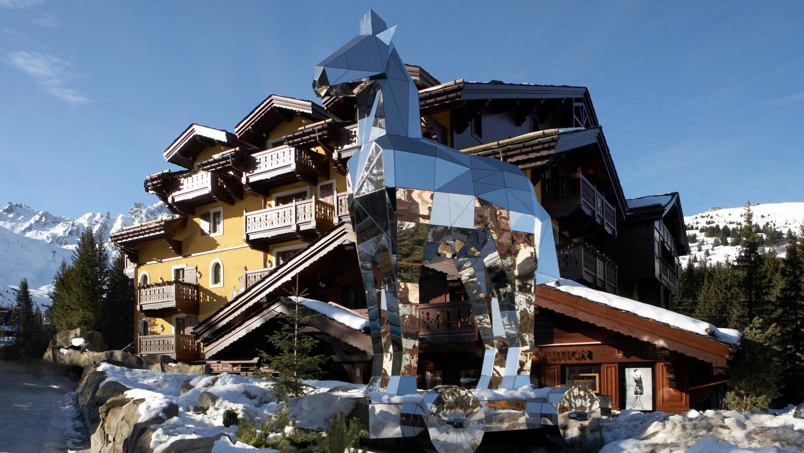 The entrance of Le Cheval Blanc in Courchevel, with Bruno Peinado's Trojan Horse... Five-star Contemporary Art