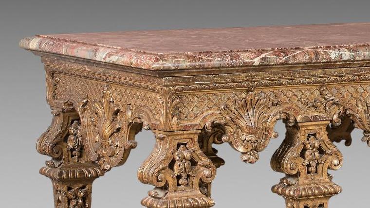 Première moitié du XIXe siècle. Table de milieu en bois sculpté et doré de style... Le bois doré dans toute la majesté du style Louis XIV