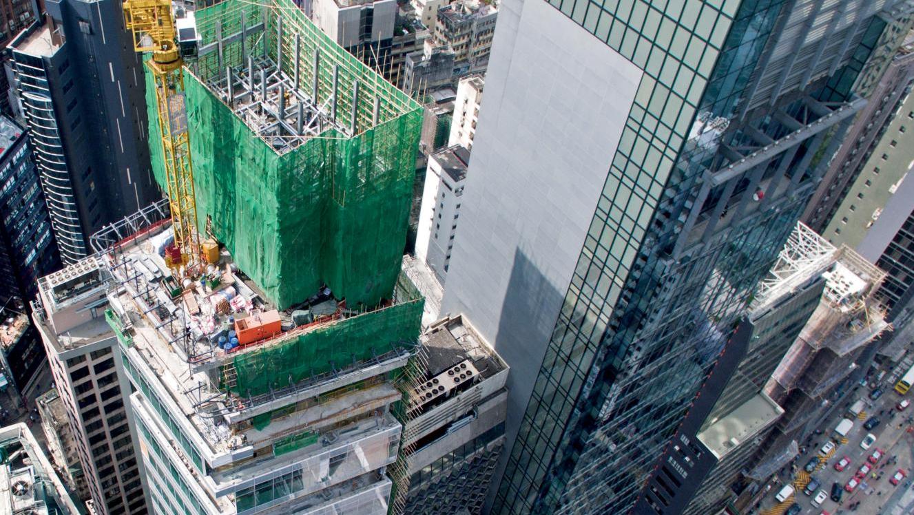 Conçu par l’architecte star William Lim, l’immeuble H Queen’s, en construction (à... Hong Kong, un marché qui prend de la hauteur