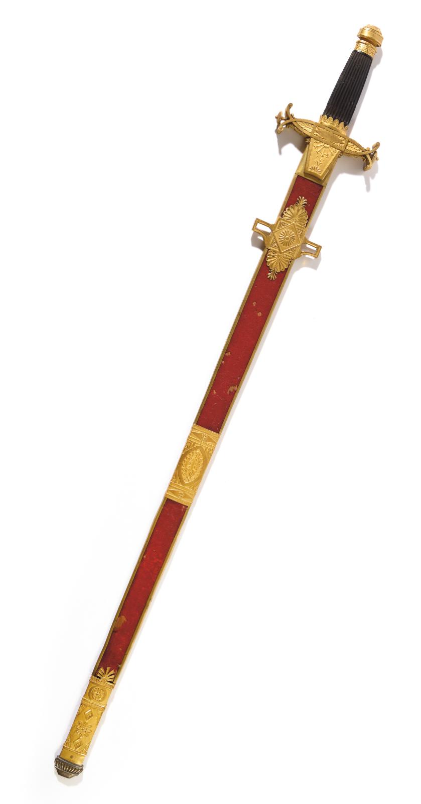 Ce glaive donne une idée du faste  hérité de l’Ancien Régime  de la tenue des hérauts d’armes, comme le montre un dessin de Jean-Baptiste Isabey : pou