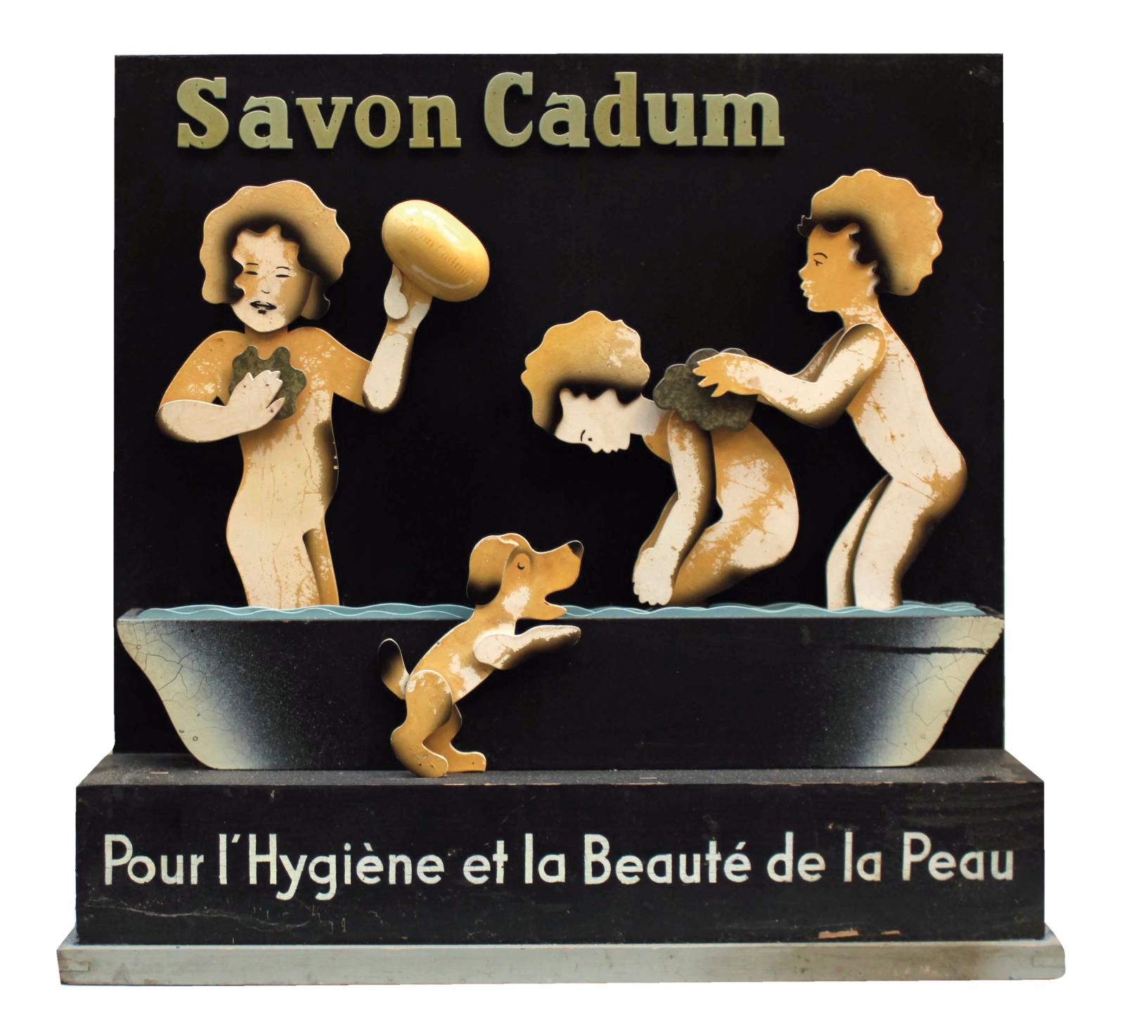 Automate Betterway, France, fin des années 1930. Savon Cadum,présentoir automate de vitrine en bois découpé peint à mécanisme électromécan