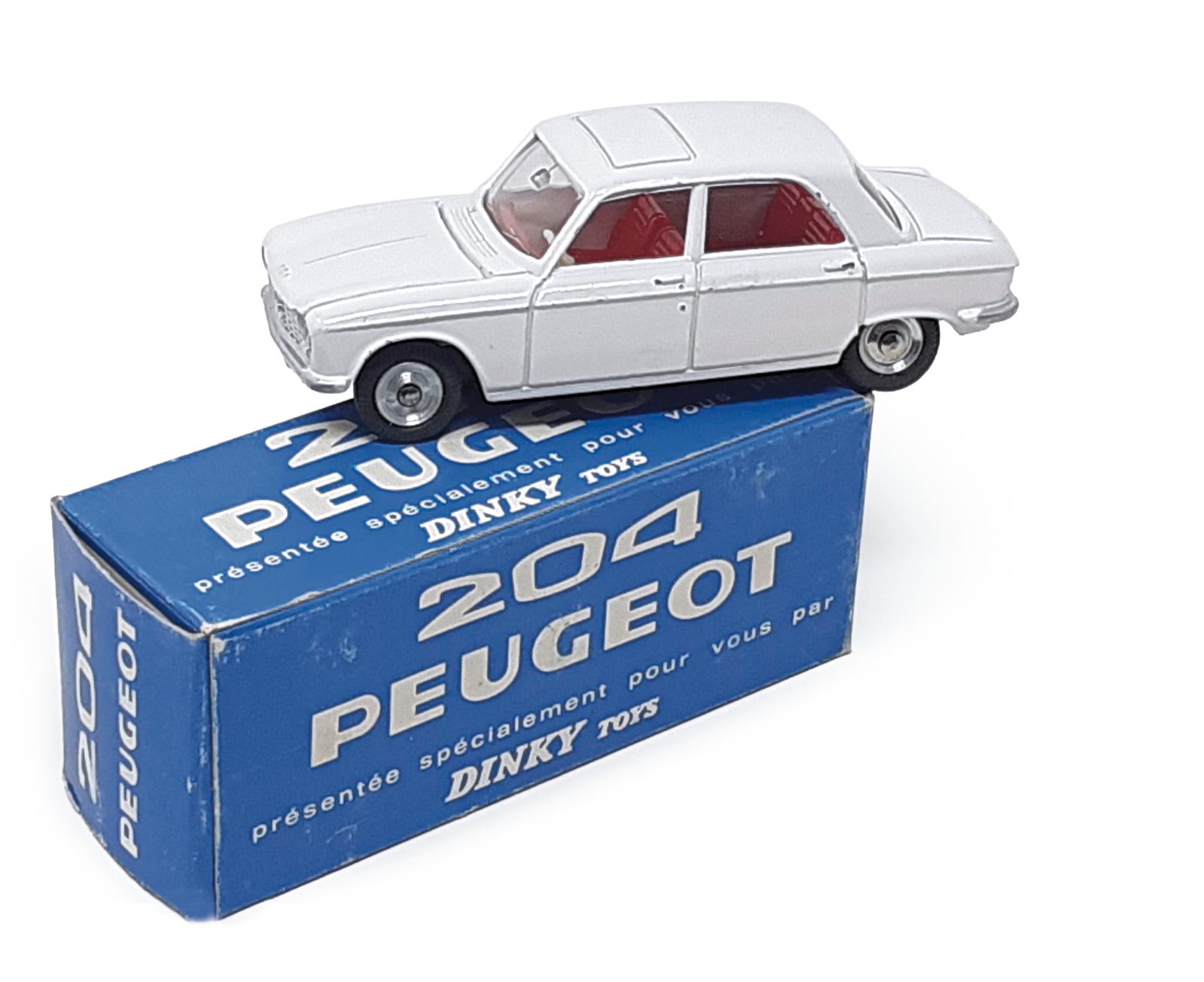 Dinky Toys France, 1965. Peugeot 204 berline, 1/43, réf. 510, couleur blanc pur, modèle promotionnel livré en avant-première du lancement 