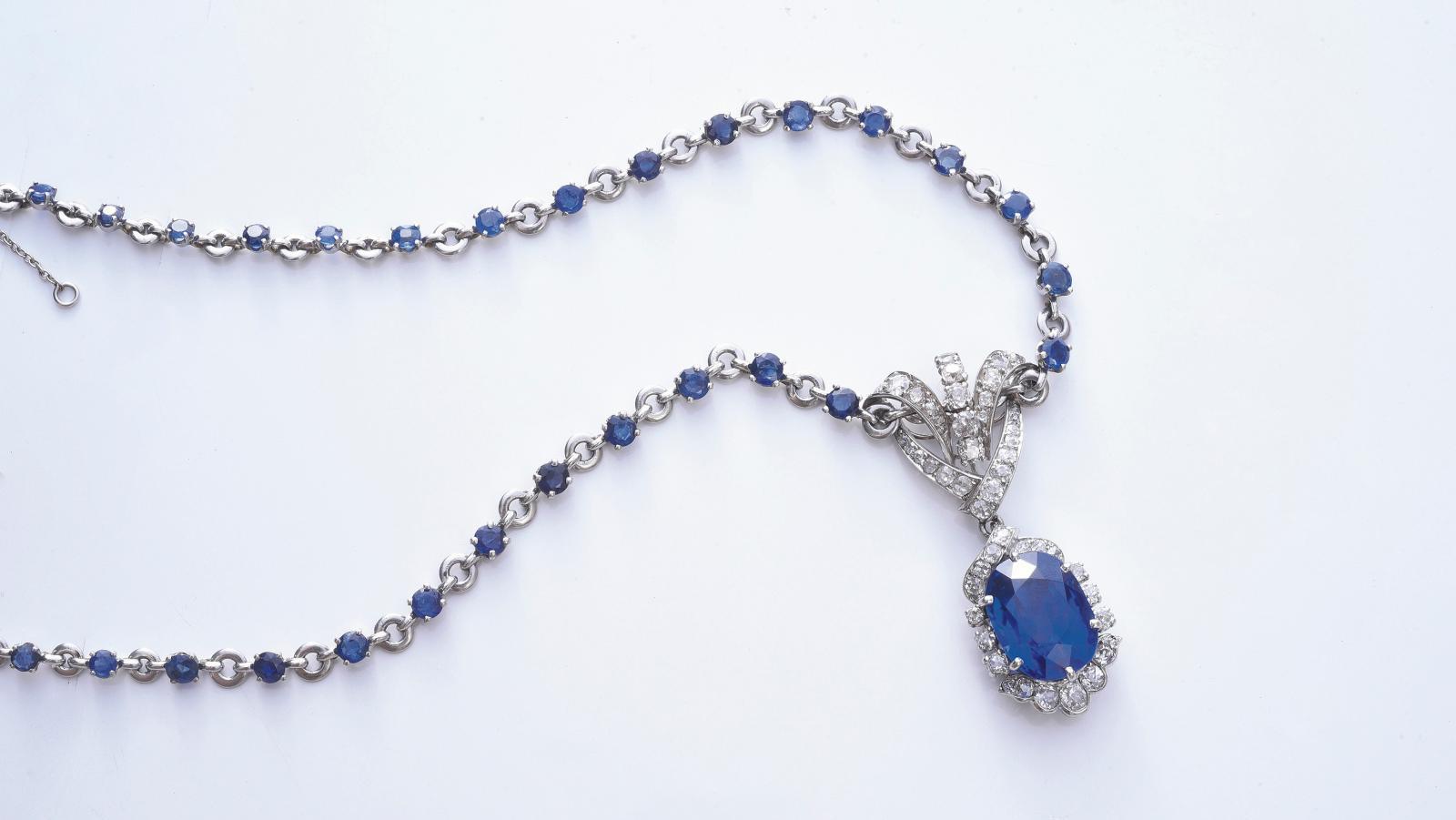 Van Cleef & Arpels. Jointed platinum necklace, the links alternating with 38 small... A Beautiful Sapphire by Van Cleef & Arpels