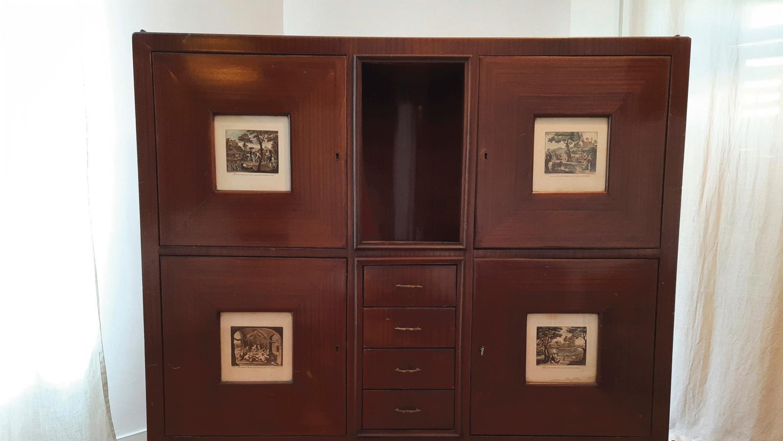 Attribué à Paolo Buffa (1903-1970), cabinet en bois de placage ouvrant à quatre portes,... Inspiration classique pour un meuble art déco