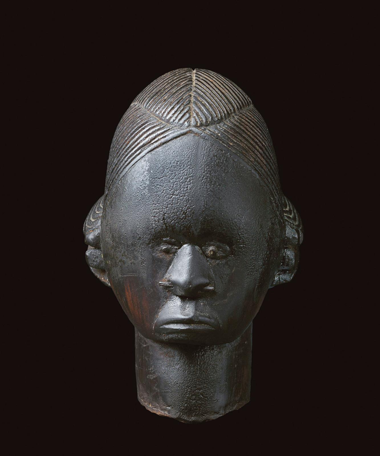 Wood and iron reliquary head. Gabon, Fang-Betsi, c. 1700-1850.Photo: Matt Pia - Al Thani Collection. All rights reserved