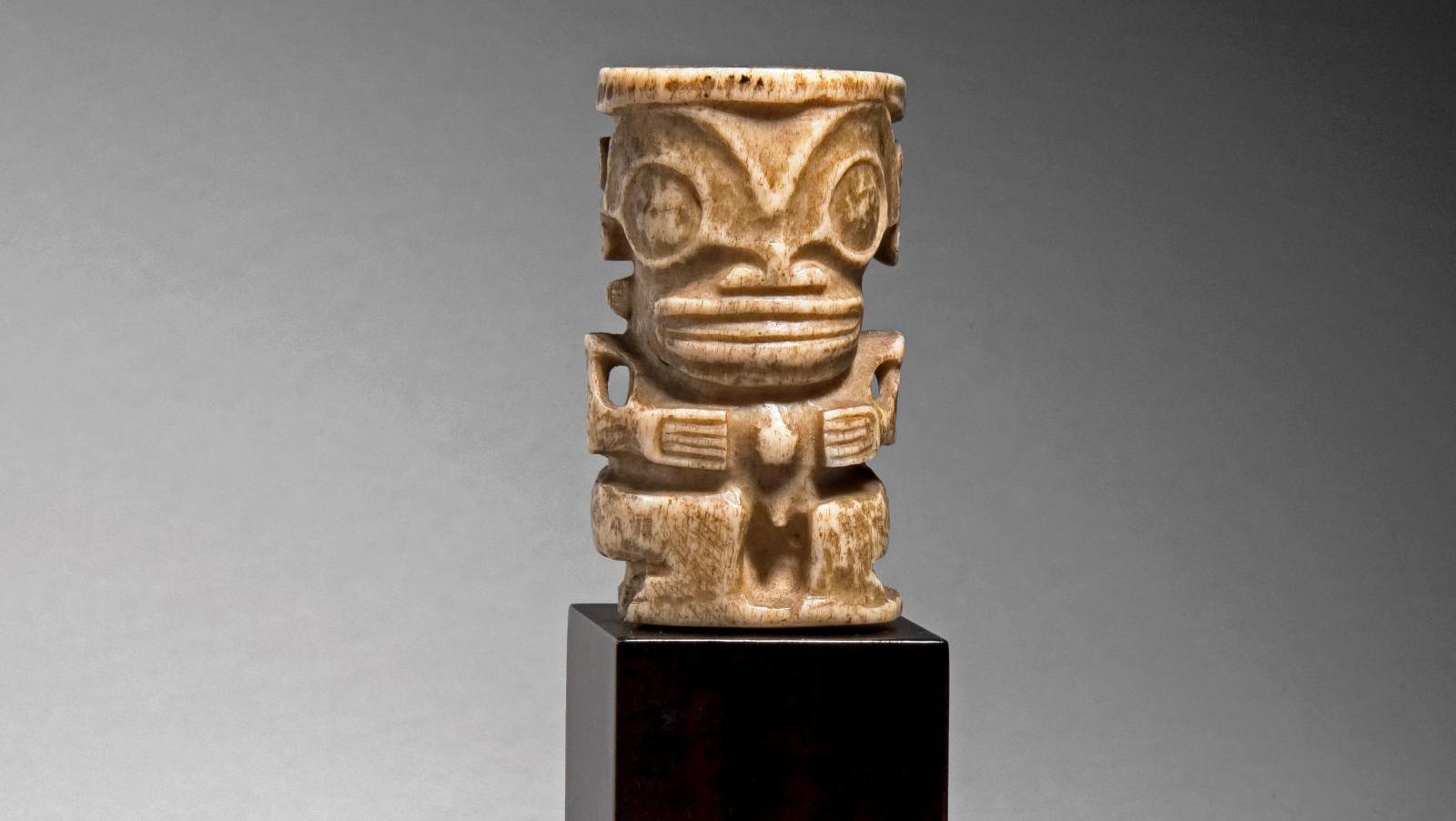 Marquesas Islands, Ivipo’o ornament representing a tiki, bone, h. 5 cm.Estimate:... A Sizeable Collection