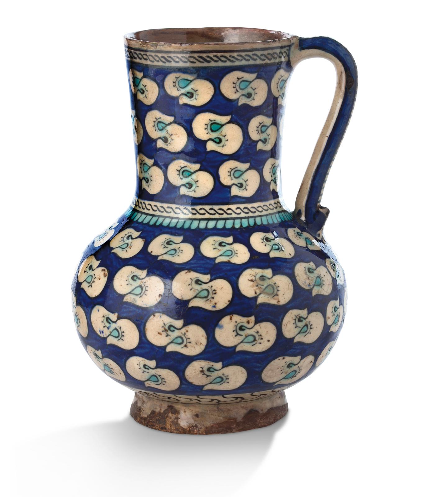 Iznik, Ottoman Turkey, c. 1550, siliceous ceramic pyriform "bardak" pitcher with polychrome painted decoration under colorless glaze, "çin