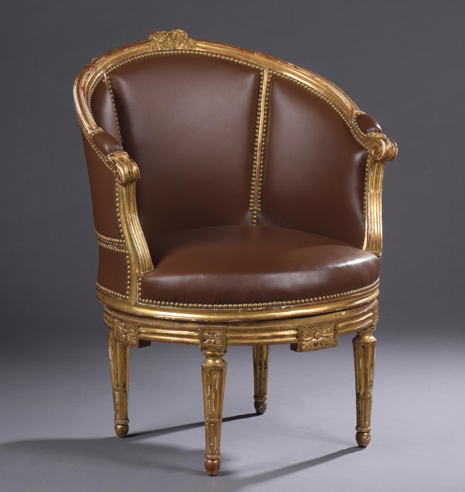 Louis XVI period, armchair stamped by the cabinetmaker Sulpice Brizard (1733-after 1796), molded, carved and gilded wood, with a wrap-arou