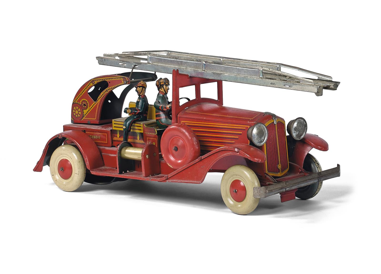 Manufacture de jouets C.R. (Charles Rossignol), véhicule de pompiers à double échelle en tôle, avec trois pompiers, l. 37 cm. Paris, Drouot, 21 octobr