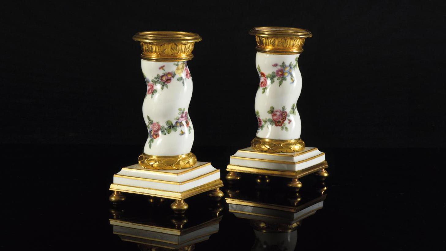 Pair of Sèvres porcelain candlesticks decorated with garlands of flowers with gilt... Selected Pieces from a Classic Sale 