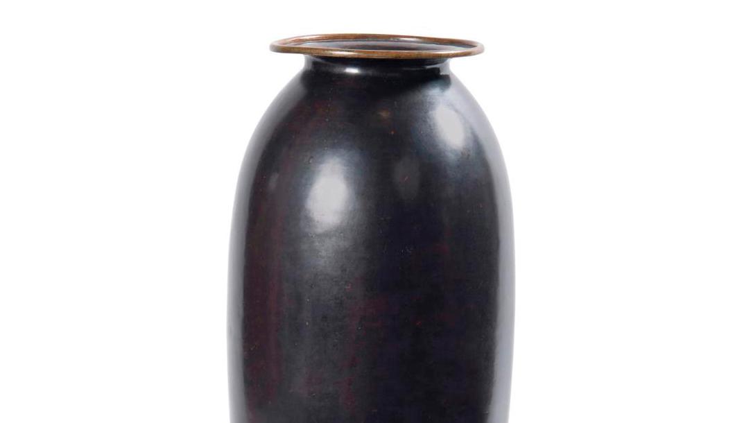 Jean Dunand (1877-1942), entirely hammered black-patinated copper vase, signed under... Dunand, Picasso and Vautrin: Appointment with the 20th Century Decorative Arts  